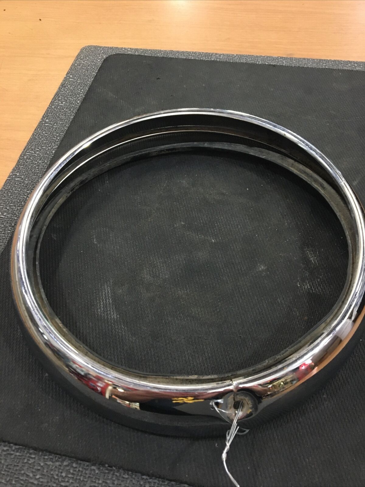 Harley Davidson OEM 7” outer headlamp ring #67712-60A