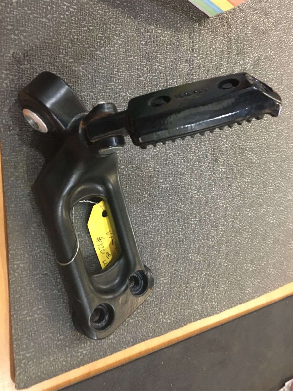 Harley Davidson OEM LH passenger footpeg and mount #51723-07