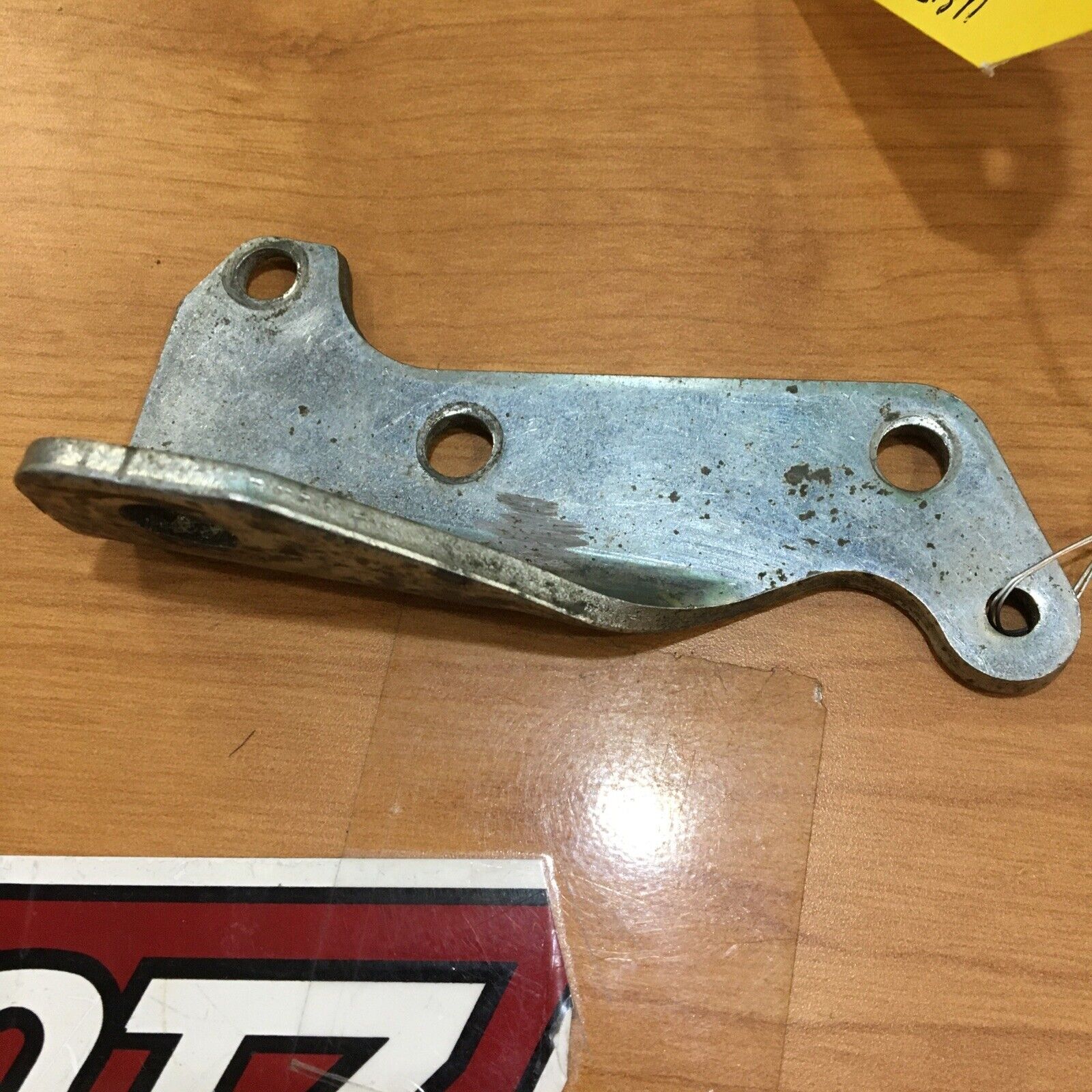 Harley Davidson OEM Front exhaust bracket #65670-82B