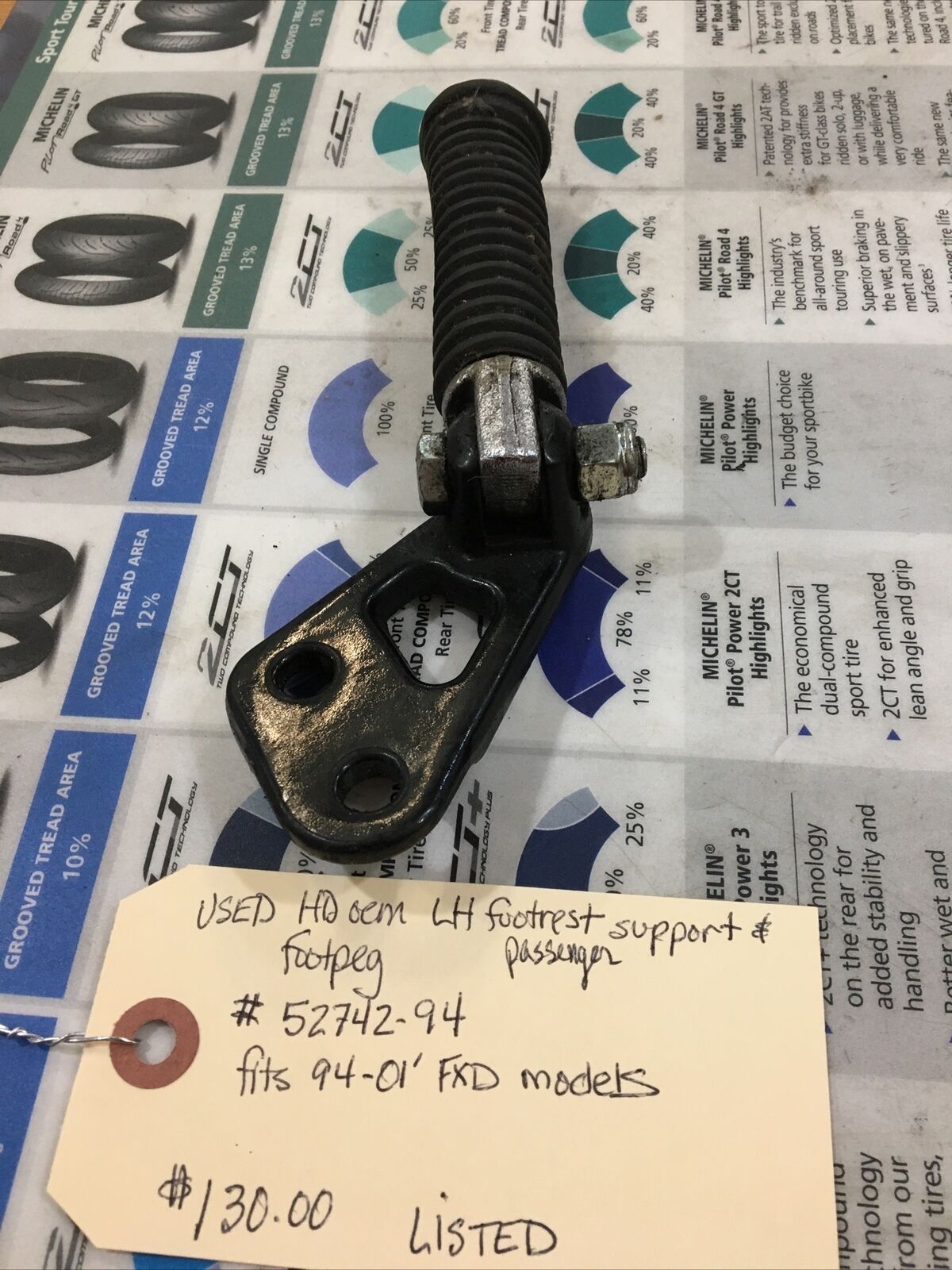 Harley Davidson oem LH Footrest Support & Footpeg #52742-94