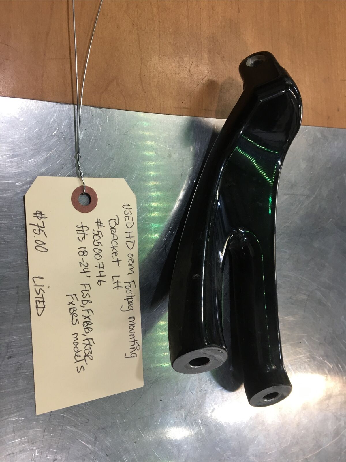 Harley Davidson oem Footpeg Mounting Bracket LH #50500746