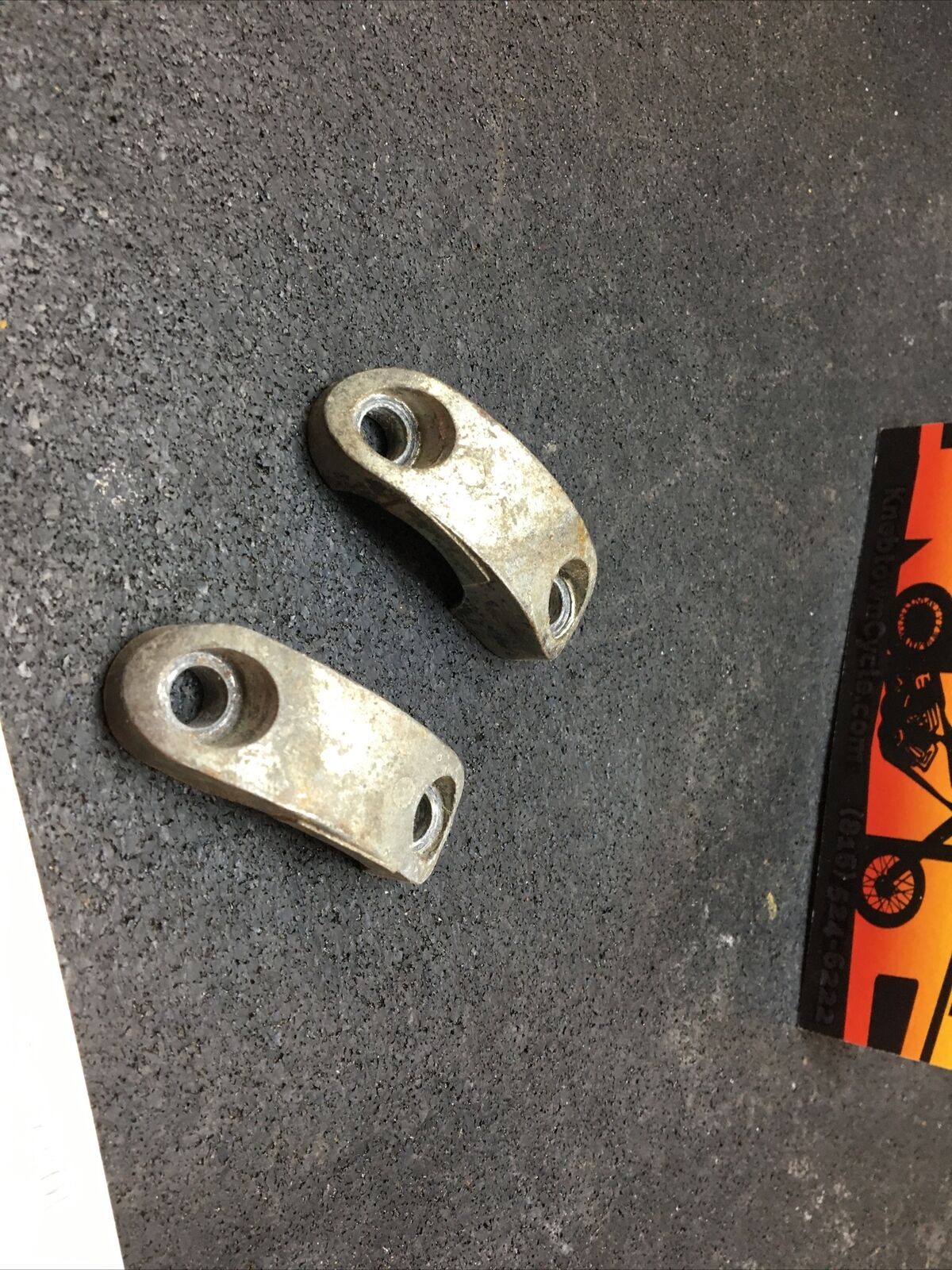 Harley Davidson oem Handlebar Clamps LH & RH #55917-79/55918-79