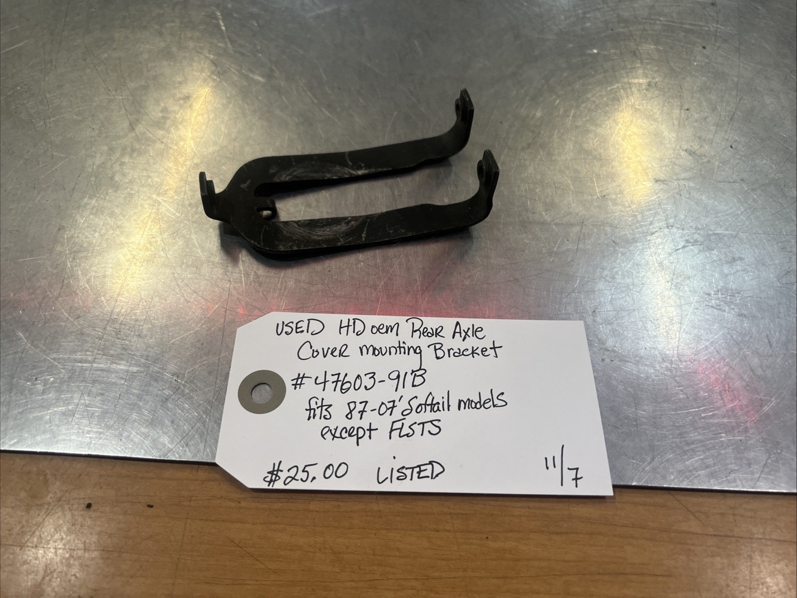 Harley Davidson oem Rear Axle Cover Mounting Bracket