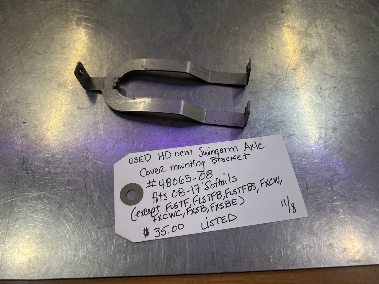 Harley Davidson oem Swingarm Axle Cover Mounting Bracket