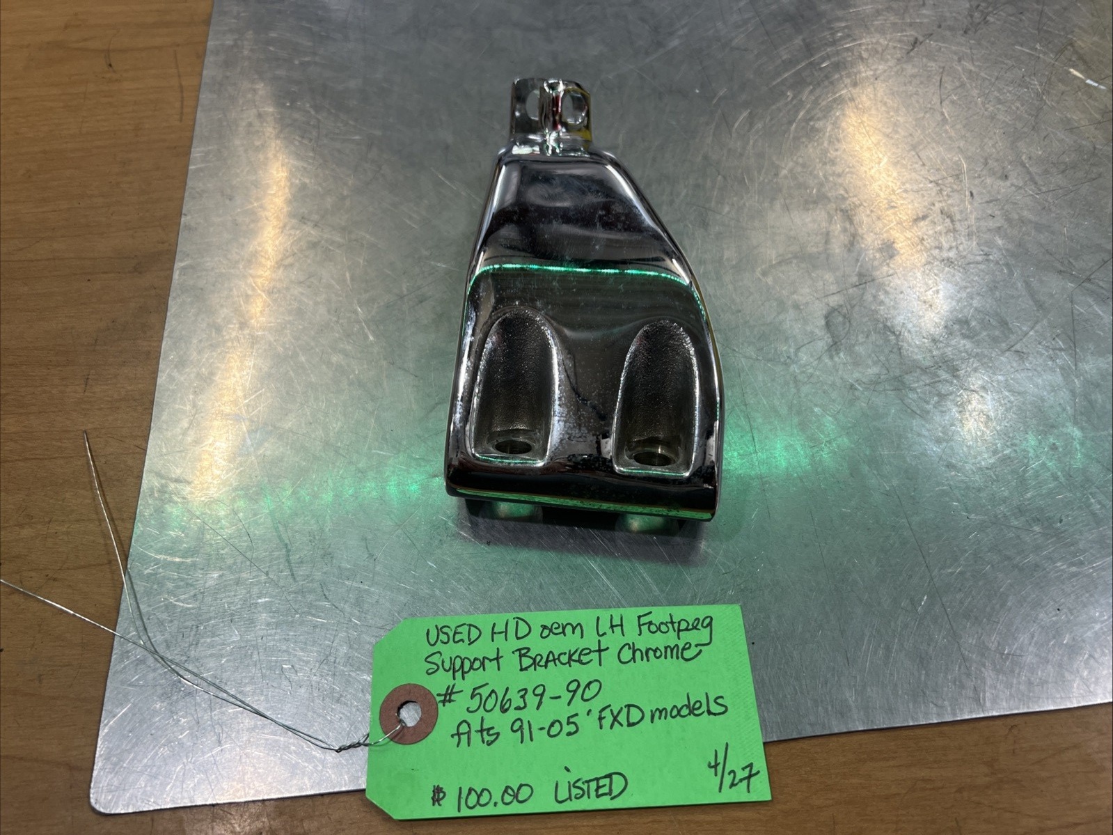 Harley Davidson oem LH Footpeg Support Bracket Chrome