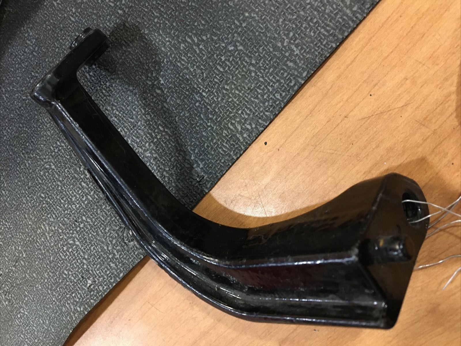 Harley Davidson OEM LH rear footboard bracket #50622-09A