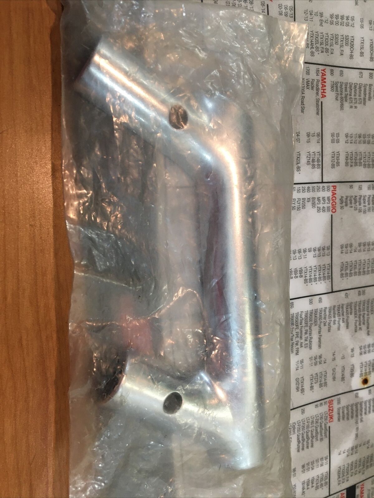 Harley Davidson OEM saddlebag guard left clamp #90940-79