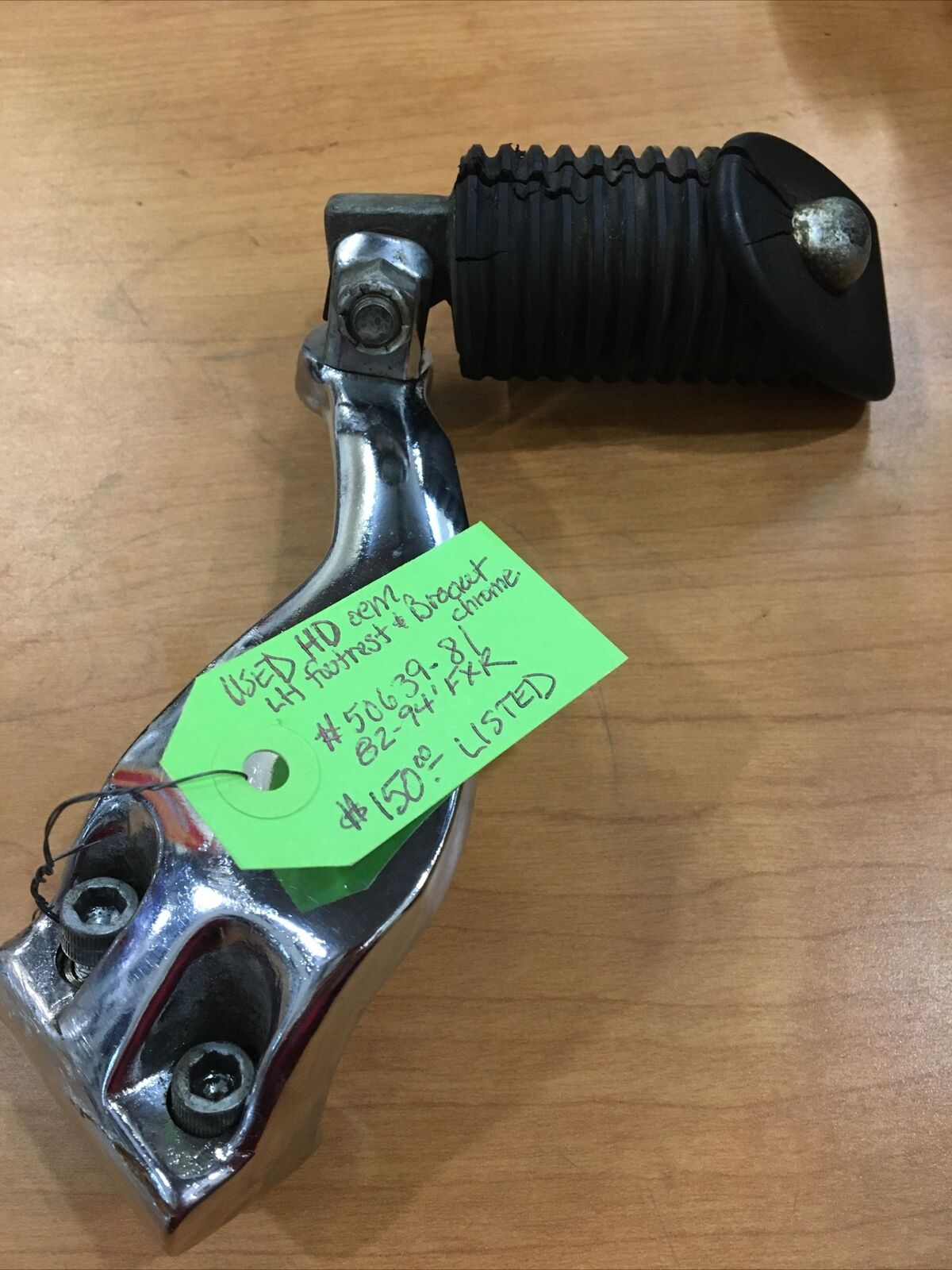 Harley Davidson OEM LH footrest and bracket #50639-81