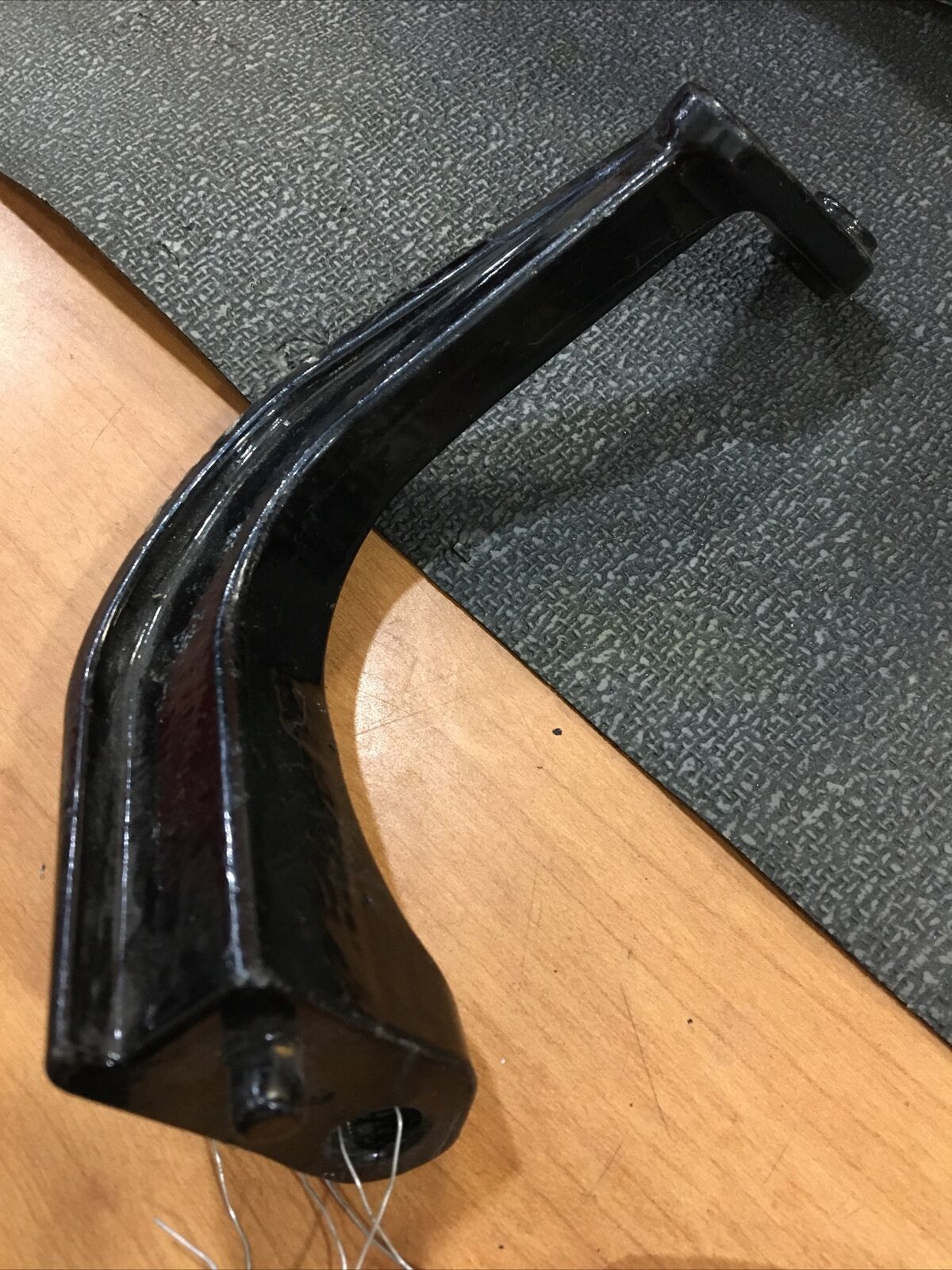 Harley Davidson OEM LH rear footboard bracket #50622-09A