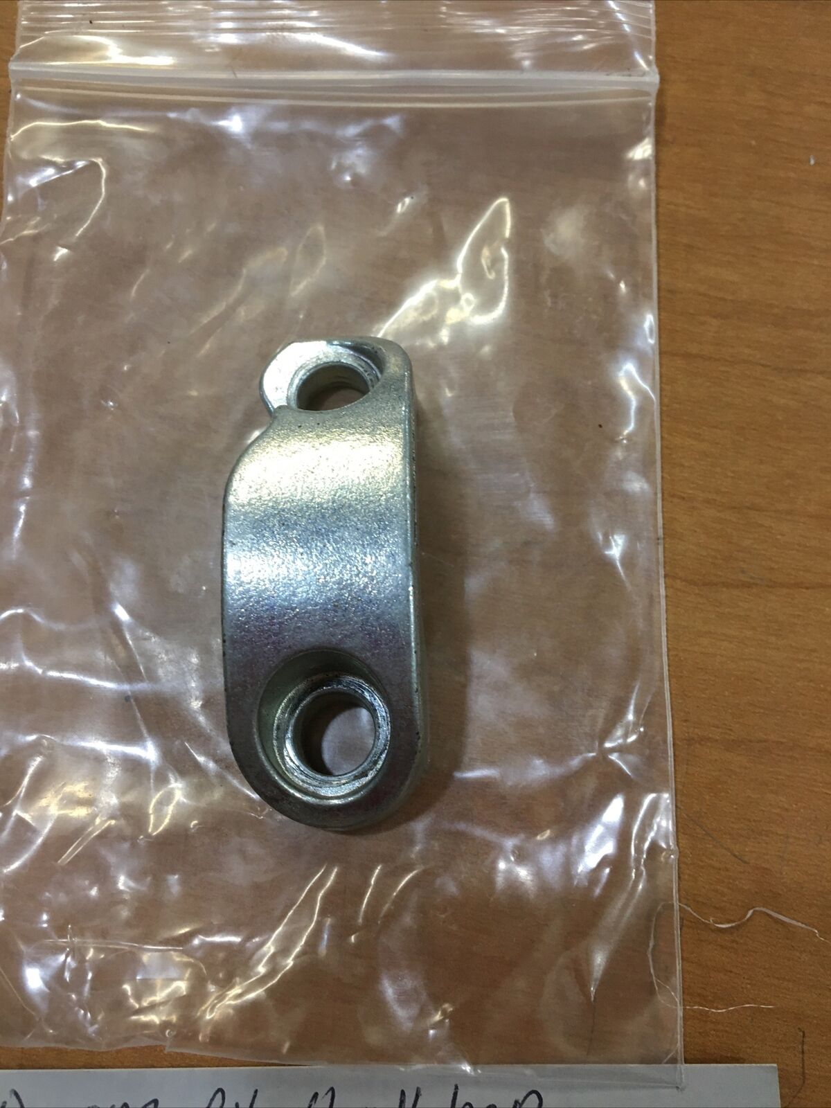 Harley Davidson OEM RH handlebar clamp #55918-79A