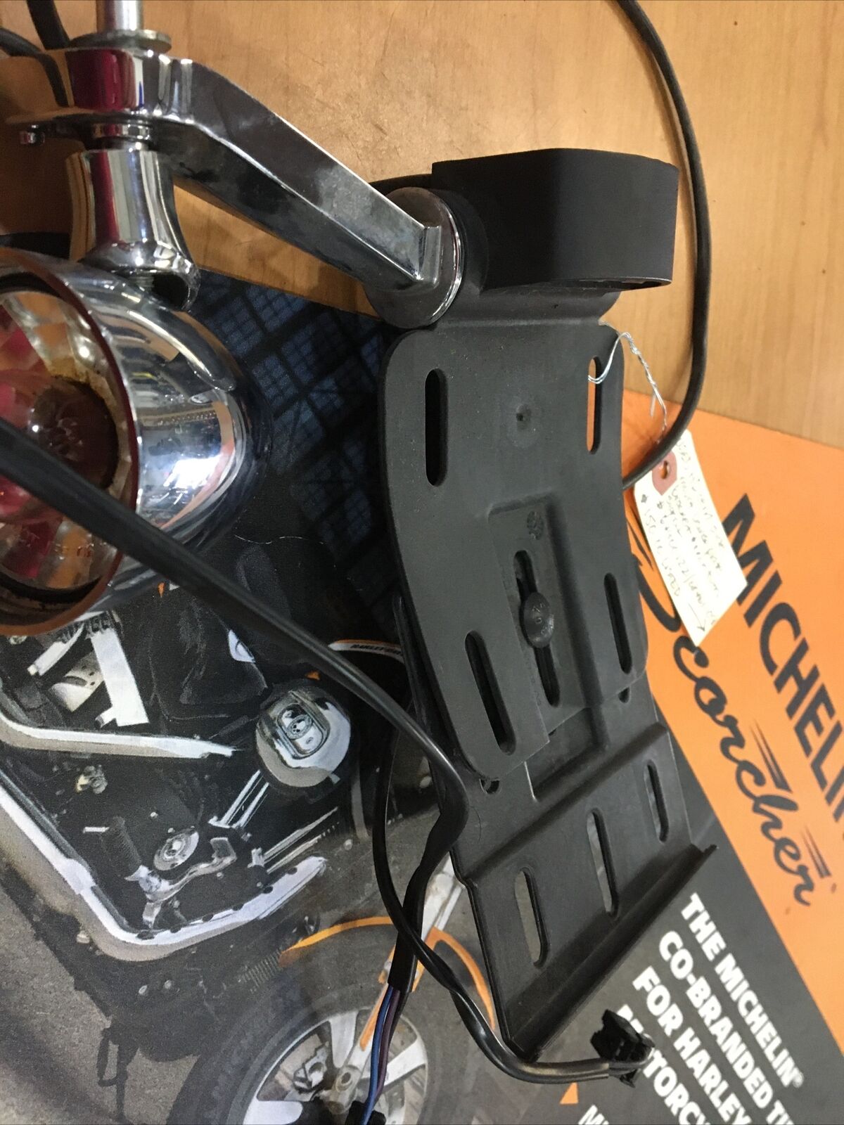 Harley Davidson oem side mount license plate bracket and turn signal #67900122